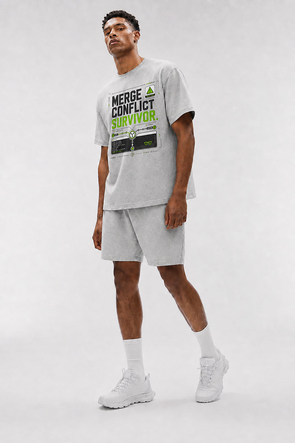 Uncropped full-body view of a model wearing the Athletic Heather Merge Conflict Survivor oversized boxy tee.