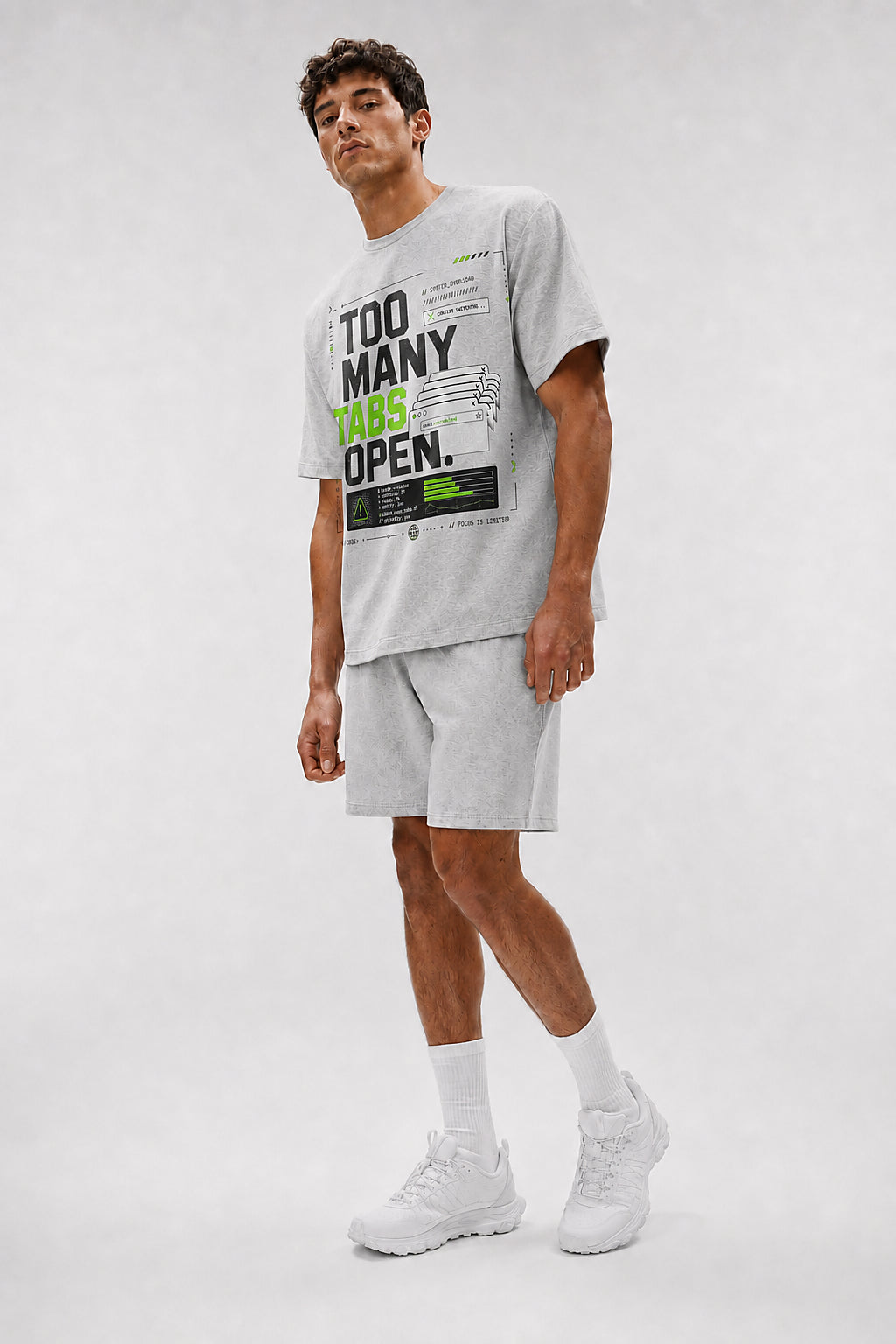 Uncropped full-body view of a model wearing the Athletic Heather Too Many Tabs Open oversized boxy tee.
