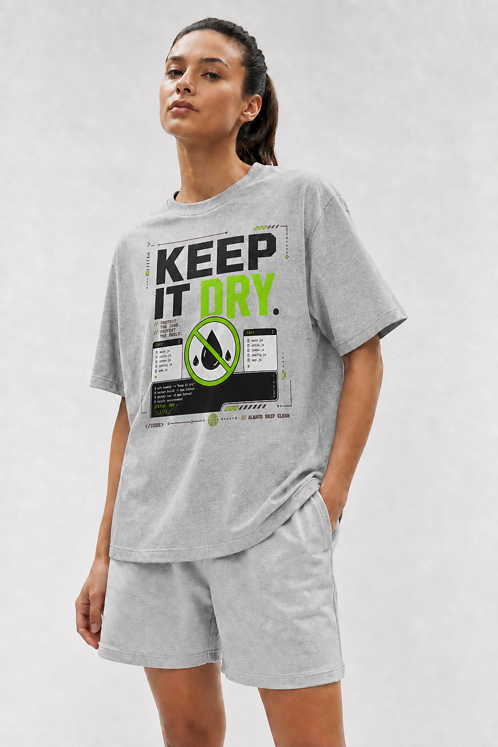 Head-safe close-up of a model wearing the Athletic Heather Keep It DRY oversized boxy tee.